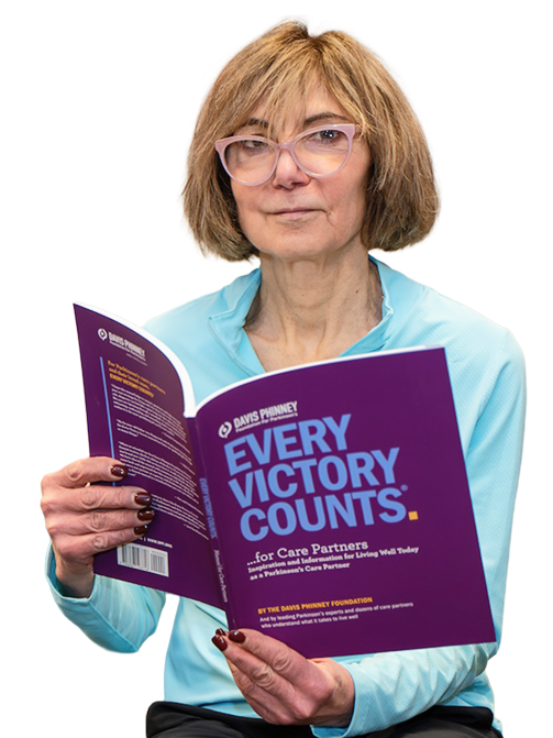 Woman reading EVC manual