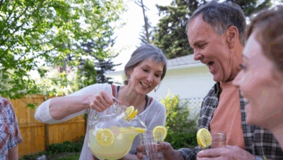adapting lemonade jar and several people drinking that lemonade