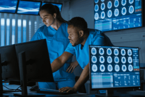 Two doctors analyzing brain scan results