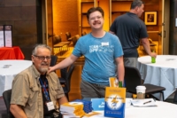 Two men posing for photo
